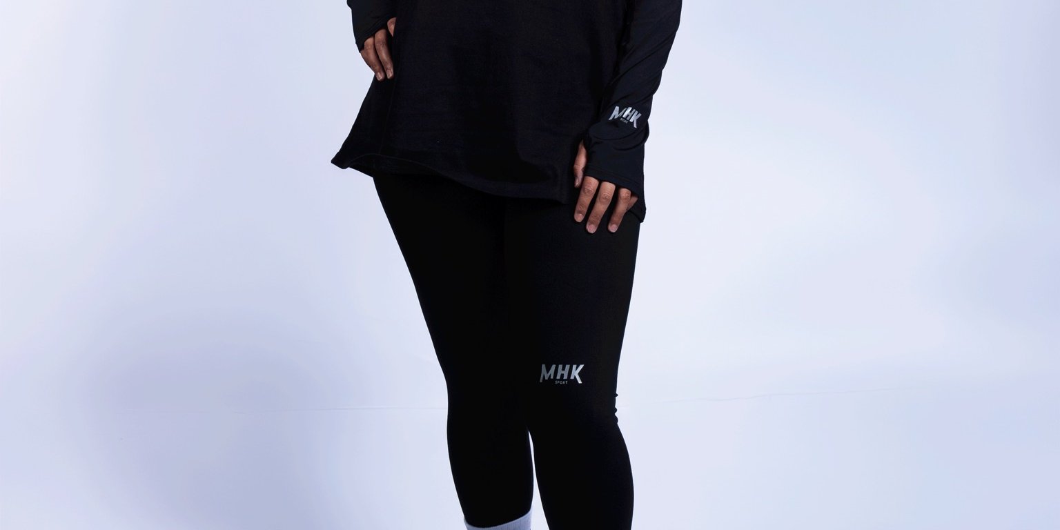 MHK Sport Legging — legging noir taille haute logo MHK, femme studio