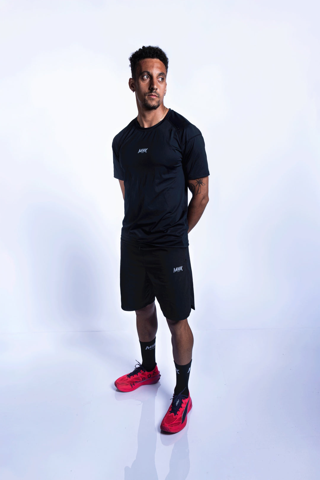 Short MHK Sport — noir, homme, studio, tenue running