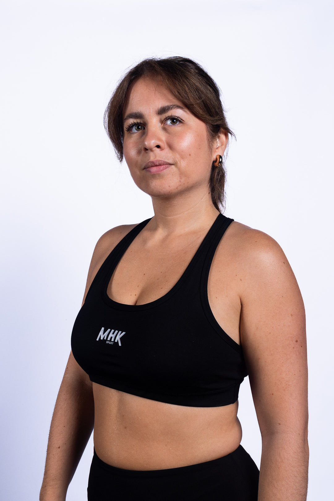 Brassière de sport MHK Sport — noir, femme, portrait studio logo poitrine
