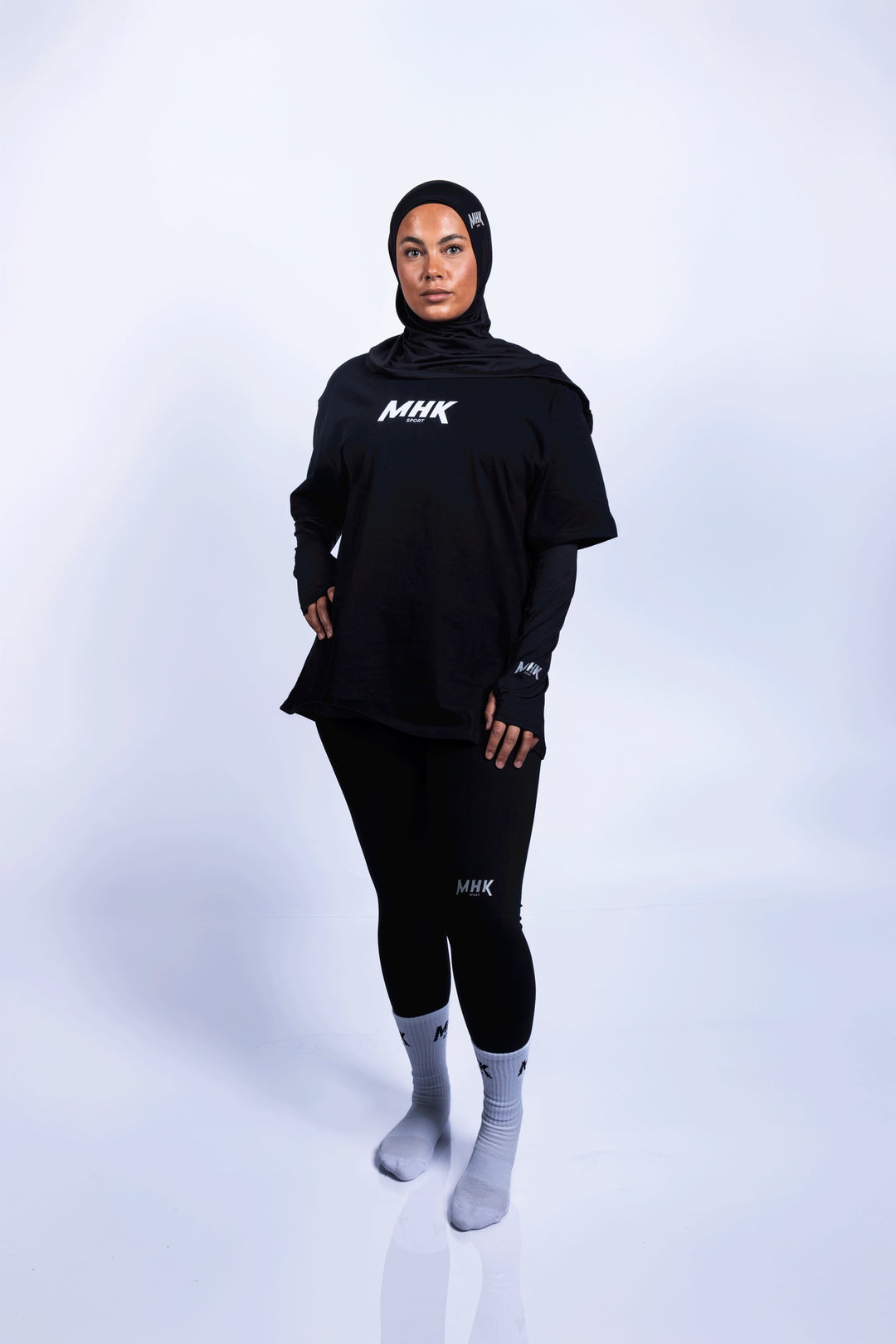 Legging MHK Sport — noir, femme, studio, logo genou