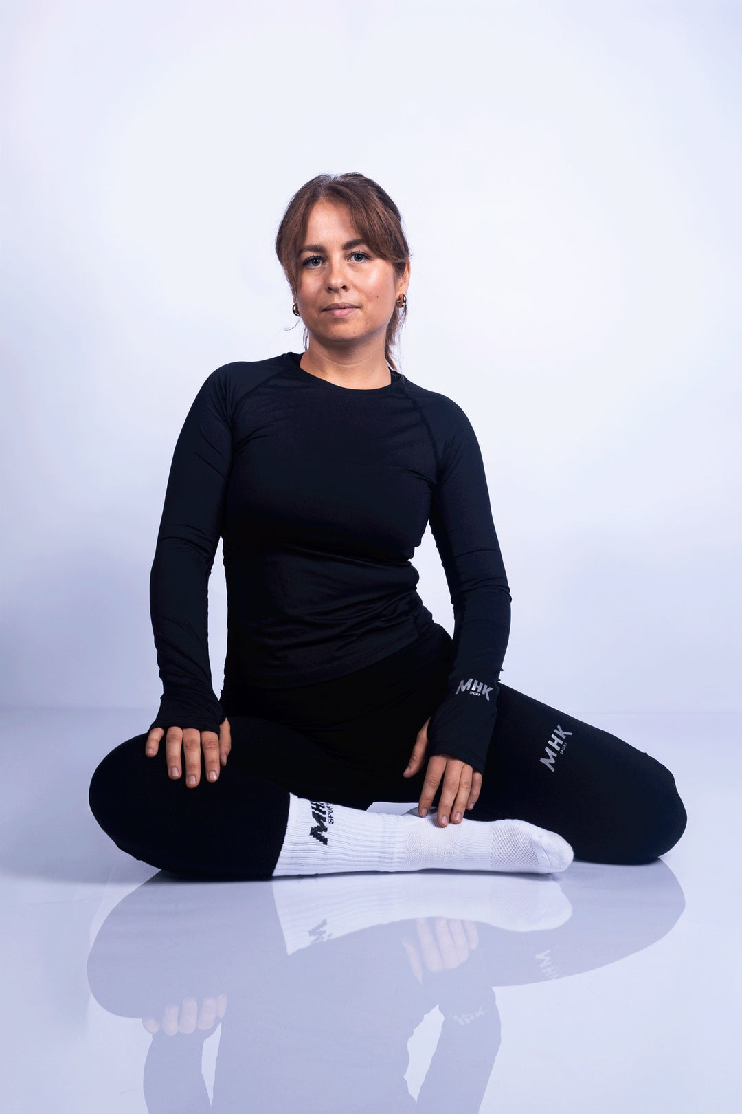Haut manches longues MHK Sport — noir, femme, studio