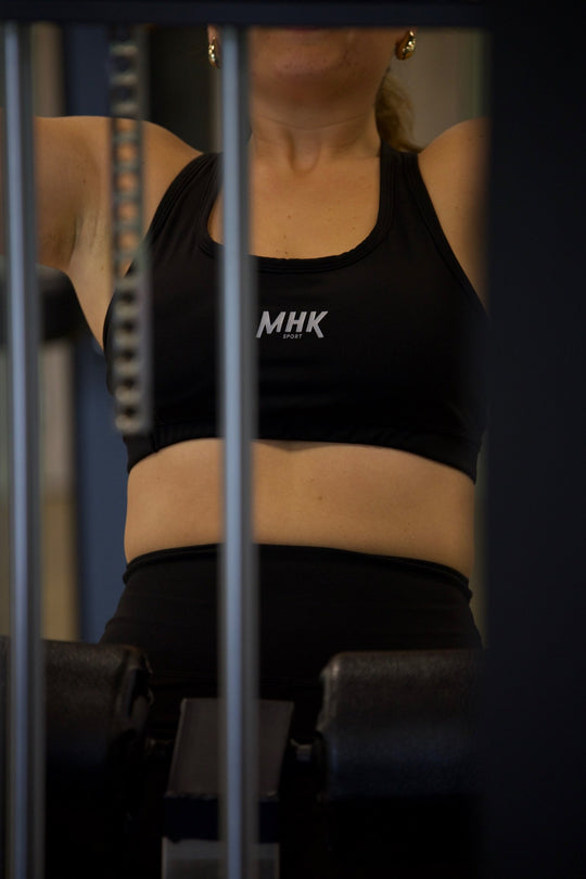 Brassière MHK Sport — noir, porté en situation